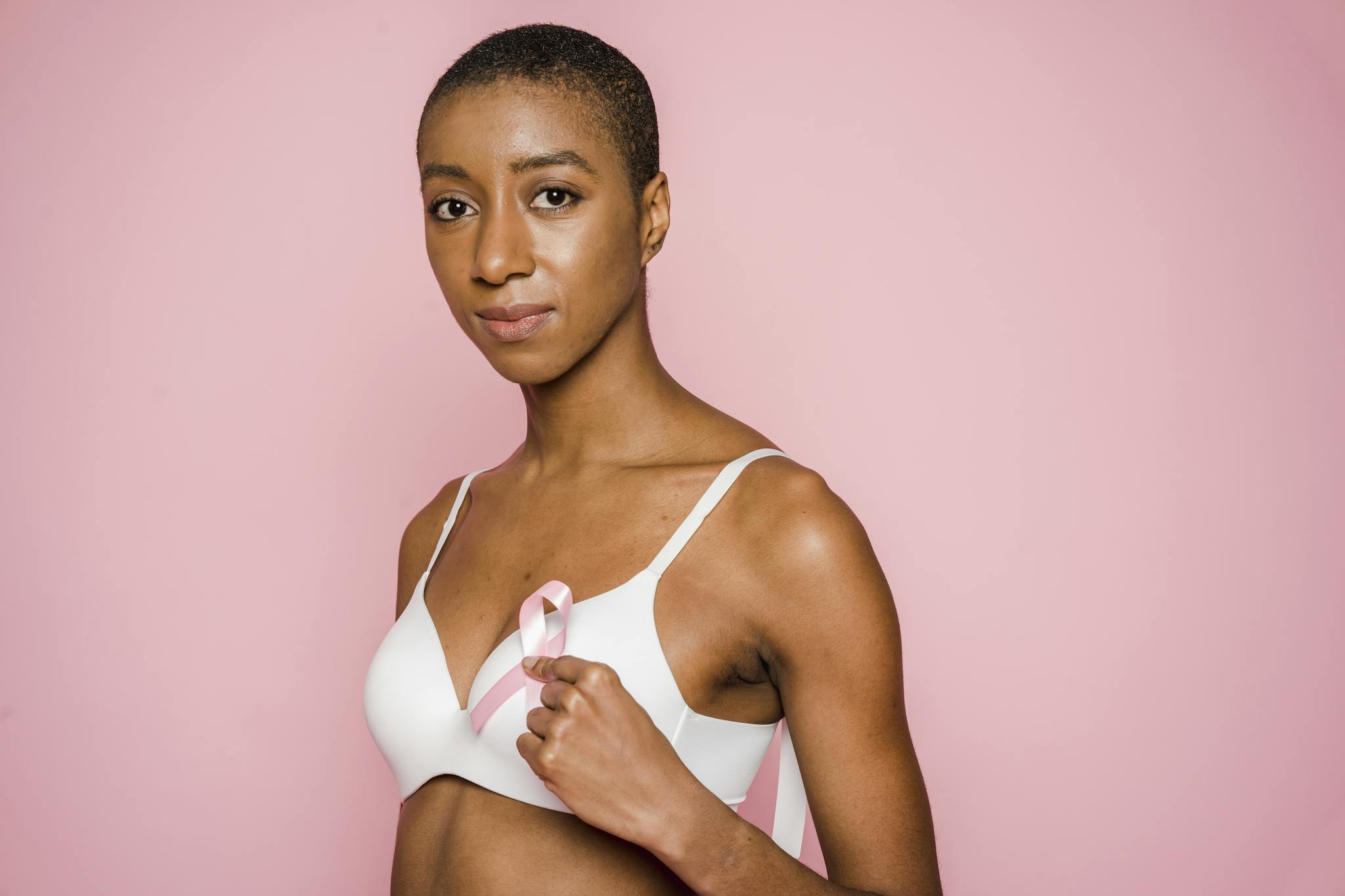 Woman Holding A Pink Ribbon